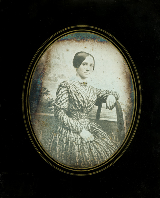 Attractive French Woman with Brooch and Earrings