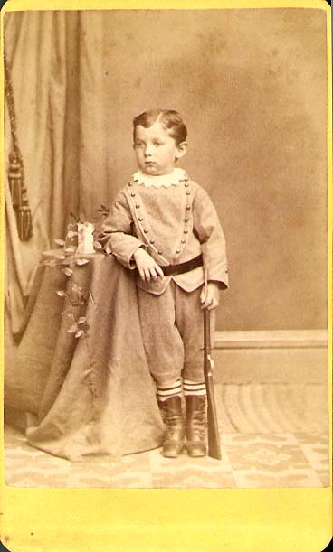 Photo Detail - Andrew Sims - Boy with Rifle