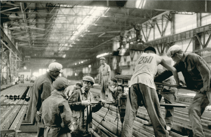 Henri Cartier-Bresson - Factory Workers with Drill, China Henri Cartier-Bresson - Factory Workers with Drill, China