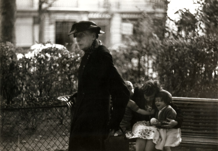 Bruce Davidson - Widow of Montmartre, Mme. Fauché (with Children Comforted by Their Mother on Park Bench)