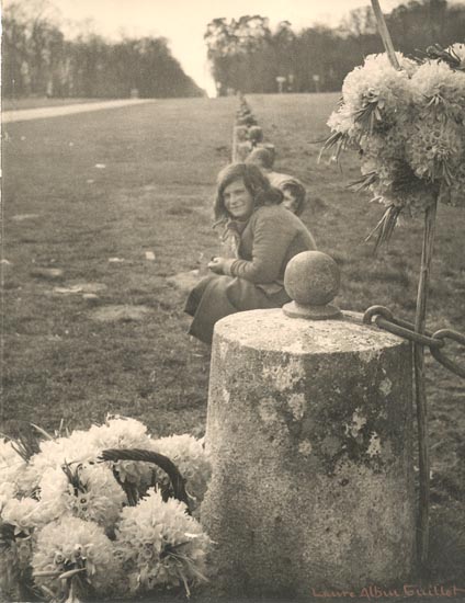Children Sitting with Flowers