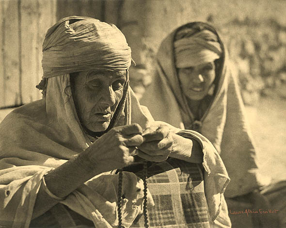 Algerian Woman Stringing Beads