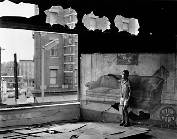Arthur Tress - Boy in Burnt-out Furniture Store, Newark, NJ Arthur Tress - Boy in Burnt-out Furniture Store, Newark, NJ