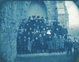 Click for details about Anonymous - Group of Children with Adult Supervision and One Doll Anonymous - Group of Children with Adult Supervision and One Doll