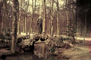 Click for details about Anonymous - Man Standing on a Rocky Bridge over a Stream with Cigarette in His Mouth Anonymous - Man Standing on a Rocky Bridge over a Stream with Cigarette in His Mouth