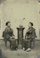 Click for details about Anonymous (Japan) - Two Japanese Women with Plant on Studio Pedestal Anonymous (Japan) - Two Japanese Women with Plant on Studio Pedestal