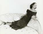 Horst P. Horst - Model in Evening Dress on Couch