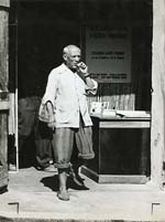 Andr� Villers - Picasso Coming out of One of His Exhibitions for a Cigarette