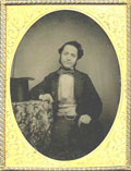 Man with Top Hat on Table