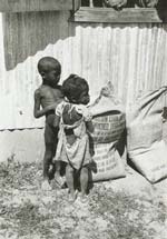 Anonymous - African Children Look in Corn Sacks from the U.S.