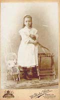 Wilhelm Stein - Little Girl with Tennis Racket and Her Doll in a Carriage