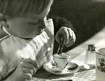 Geza Vandor - Child Enjoying His Meal