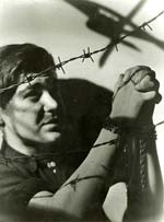 Bohumil Stastny - Boy Praying in Chains Against Barbed Wire