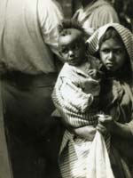 Studio Tronchett (possibly by Maurice Tabard) - Young Girl with Baby
