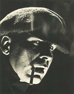 Harry S. Hood - Man Smoking Cigarette with Dramatic Lighting