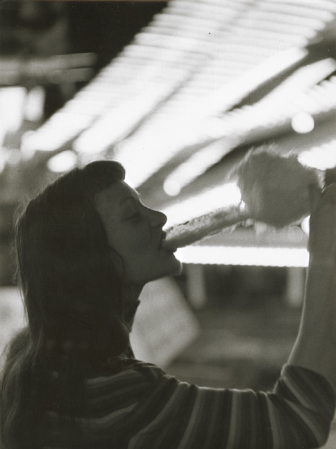 Robert Doisneau - Christiane Chevalier Eating Cotton Candy at Ivresse, Foire du Trone Robert Doisneau - Christiane Chevalier Eating Cotton Candy at Ivresse, Foire du Trone