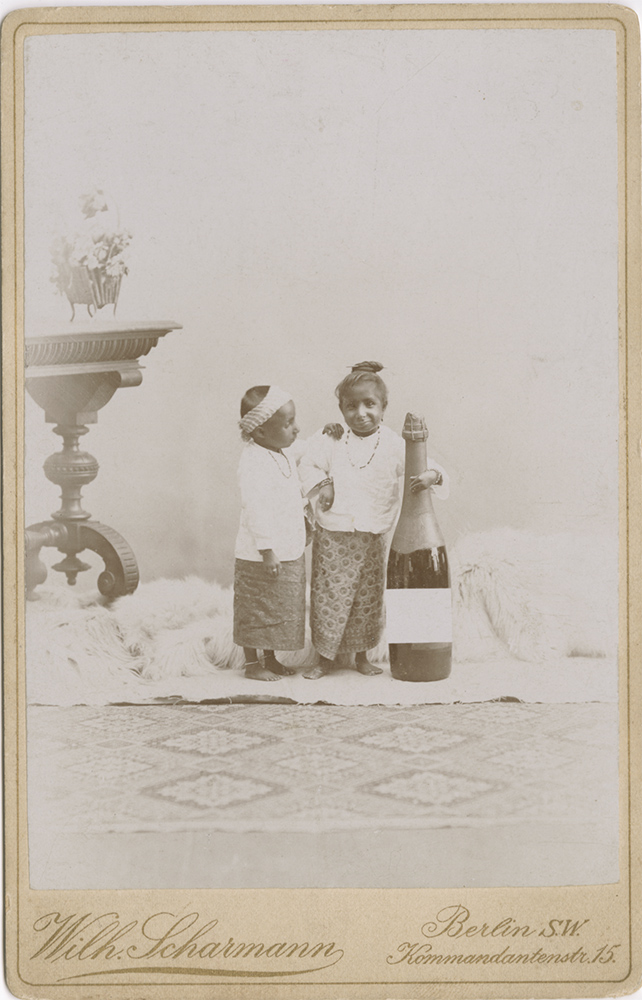 Wilhelm - Midget Children with a Large Champagne Bottle Wilhelm - Midget Children with a Large Champagne Bottle
