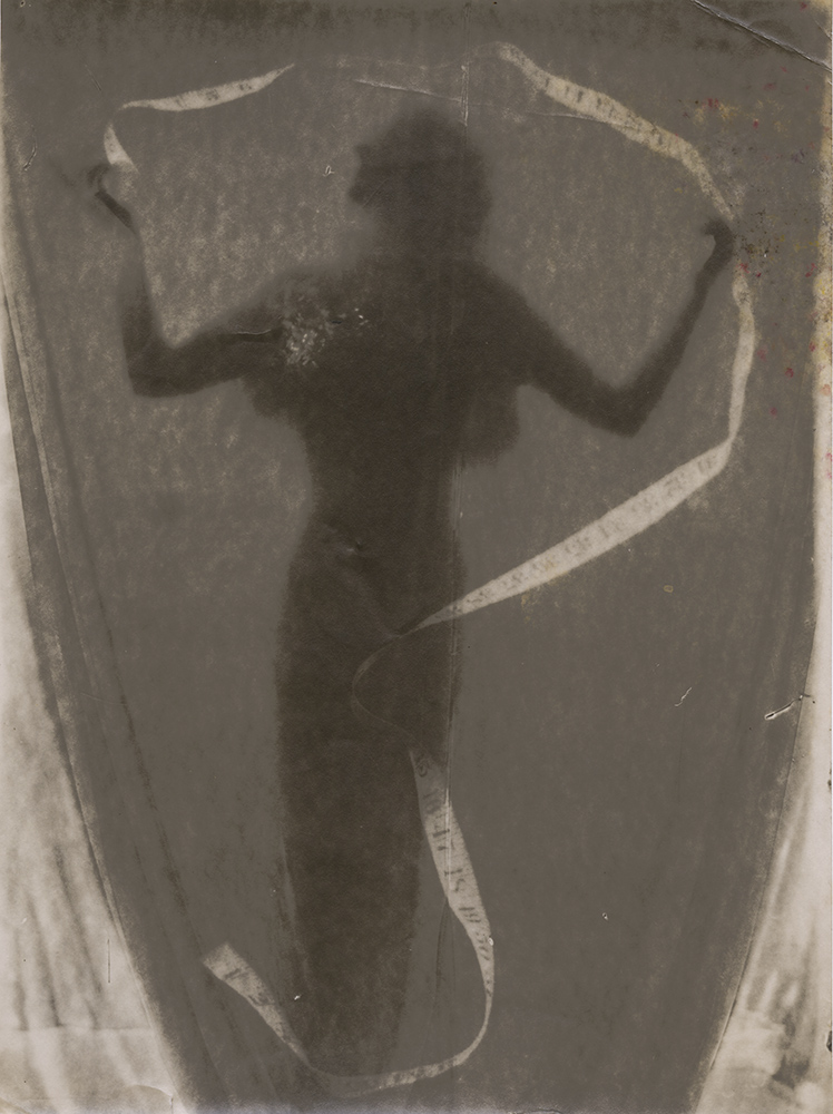 Photo Detail - Gilbert Adams - Photomontage (Woman’s Silhouette and Tape Measure) Photo Detail - Gilbert Adams - Photomontage (Woman’s Silhouette and Tape Measure)
