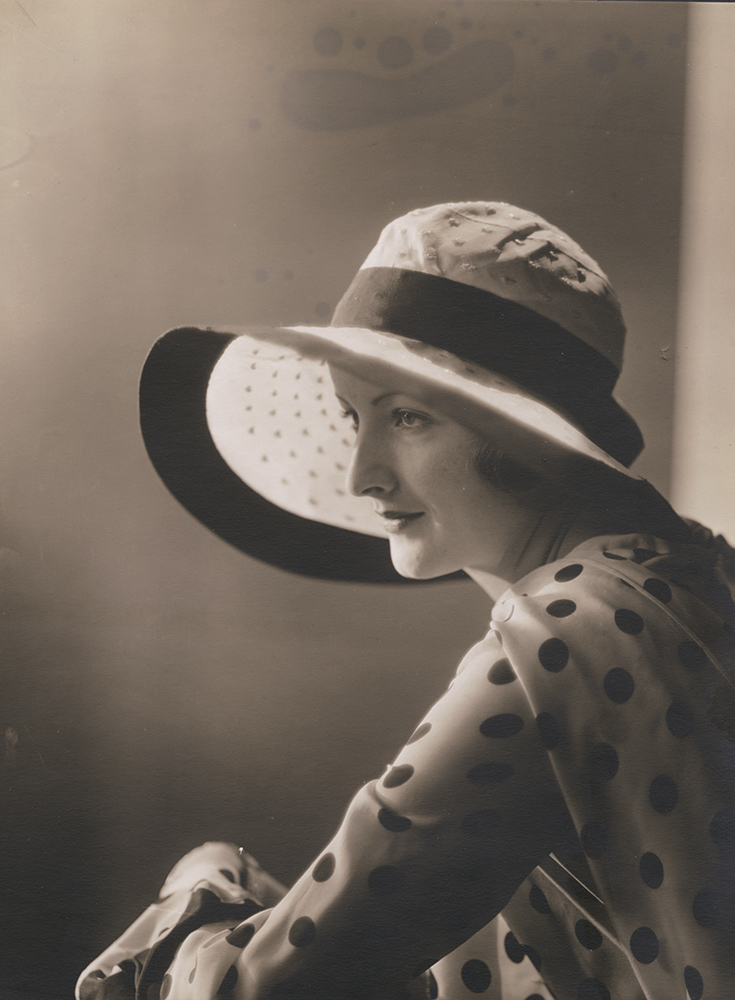 Vogue Magazine Photographer - Woman in Polka Dot Shirt and Hat Vogue Magazine Photographer - Woman in Polka Dot Shirt and Hat