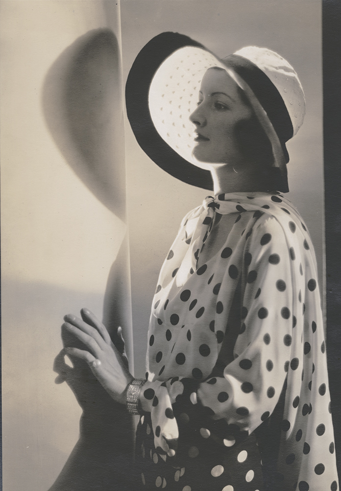 Vogue Magazine Photographer - Woman in Polka Dot Shirt and Hat Vogue Magazine Photographer - Woman in Polka Dot Shirt and Hat