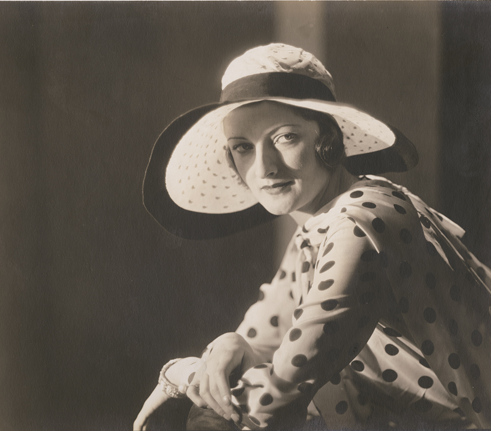 Vogue Magazine Photographer - Woman in Polka Dot Shirt and Hat