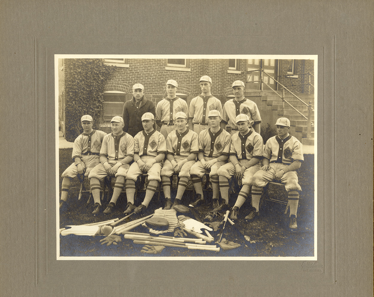 Photo Detail - Gilbert & Bacon - Baseball Team with Equipment