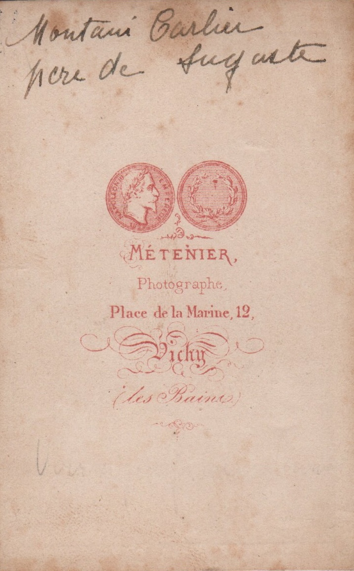 Photo Detail - Paul Méténier. - Man Sitting by Pedestal with Lens and CDV Album