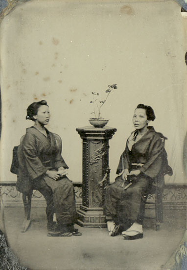 Photo Detail - Anonymous (Japan) - Two Japanese Women with Plant on Studio Pedestal Photo Detail - Anonymous (Japan) - Two Japanese Women with Plant on Studio Pedestal