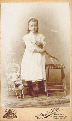 Wilhelm Stein - Little Girl with Tennis Racket and Her Doll in a Carriage