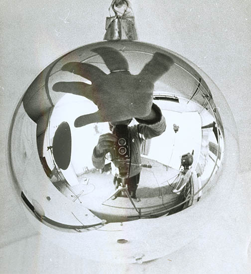 Geza Vandor - Fisheye Self Portrait with Twin Lens Camera and Christmas Bulb