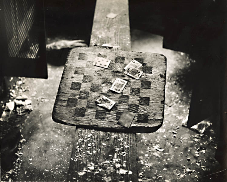 Arthur Tress - Cards and Checkerboard in Abandoned Locker Room for Railroad Workers